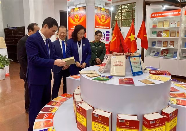 Visitors attend the Vietnamese National Assembly – An 80-Year Journey of Construction and Development exhibition at the National Library of Việt Nam in Hà Nội on January 5. — Photo courtesy of MCST