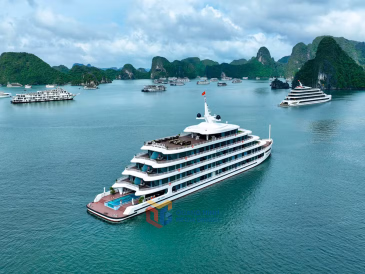 Cruise boats add a vibrant highlight, making the natural landscape of Ha Long Bay even more lively and captivating.