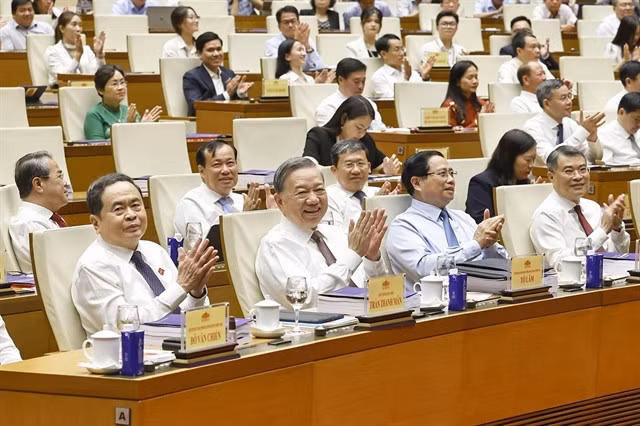 Party General Secretary Tô Lâm, Prime Minister Phạm Minh Chính and National Assembly Chairman Trần Thanh Mẫn attend the conference on digital knowledge and skills framework for a modern legislature in Hà Nội on Saturday. VNA/VNS Photo