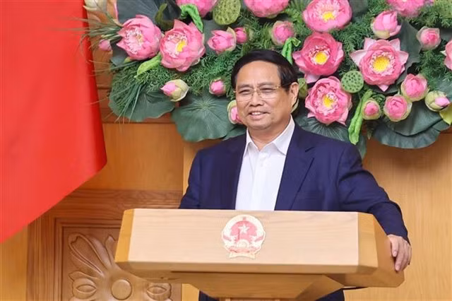 Prime Minister Phạm Minh Chính speaks at the working session with the Policy Advisory Council on Sunday. VNA/VNS Photo