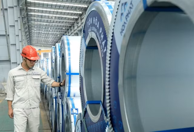 Inside Hòa Phát's galvanised steel facility in Hưng Yên Province. Hòa Phát's shares topped the market contributors yesterday with growth of 2.4 per cent. — VNA/VNS Tuấn Anh