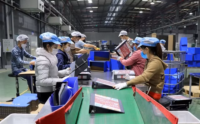 DELI VIETNAM in Yên Phong Industrial Park of Bắc Ninh province specialises in manufacturing office machinery and equipment. Businesses still need a more open business climate to further grow. -- VNA/VNS Photo