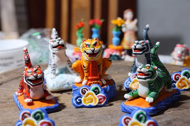 A set of five tiger figurines for the current lunar year, the Year of the Tiger. — Photo vietnamplus.vn