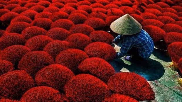 A photograph titled “Sunny Day” taken by Tran Viet Van is the winner in the Indigenous Cultures category at the CEFF International Environmental Photography.