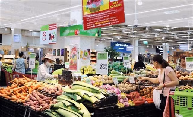 Among the 11 groups of goods and services used to calculate the CPI, ten had higher prices than in the previous month, with the group of other goods and services reporting the highest rise of 2.84 per cent. — VNA/VNS Photo