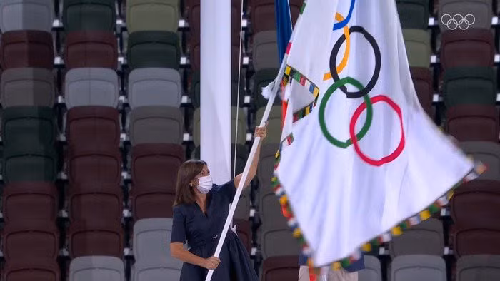 The Olympic flag is lowered and handed to Paris for hosting the next Summer Olympics. (Photo: Tokyo 2020)