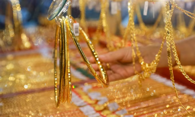 Gold prices fall marginally