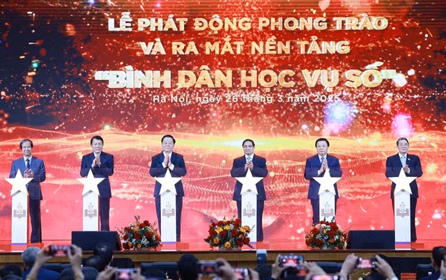 Prime Minister Phạm Minh Chính attends the launch event of the nationwide Digital Literacy Movement in Hà Nội on Wednesday. — VNA/VNS Photo Dương Giang
