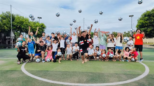 In addition to freestyle football, Đỗ Kim Phúc also joins in different projects relating to football and children. — Photo courtersy of Kim Phúc