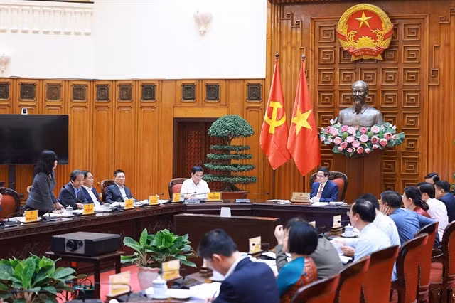 Prime Minister Phạm Minh Chính chairs a government meeting with the Ministries of Education and Training &amp; Ministry of Health in Hà Nội on March 25. — VNA/VNS Photo