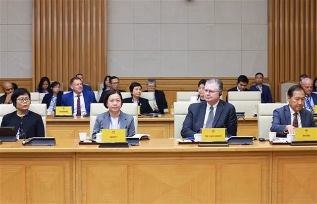 Members of the US-ASEAN Business Council delegation attend the meeting with Prime Minister Phạm Minh Chính. — VNA/VNS Photo Dương Giang