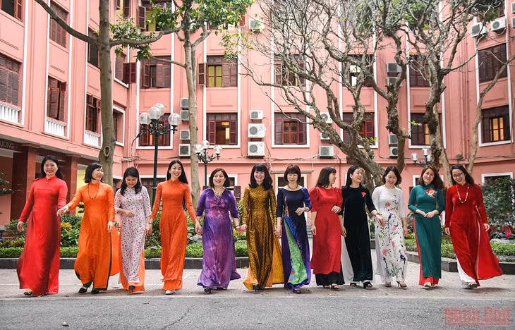 Female staff from the Ministry of Planning and Investment in colourful ao dai