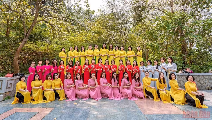 Women of Dien Bien Province's Department of Natural Resources and Environment in bright-coloured ao dai (Photo: THANH DAT)