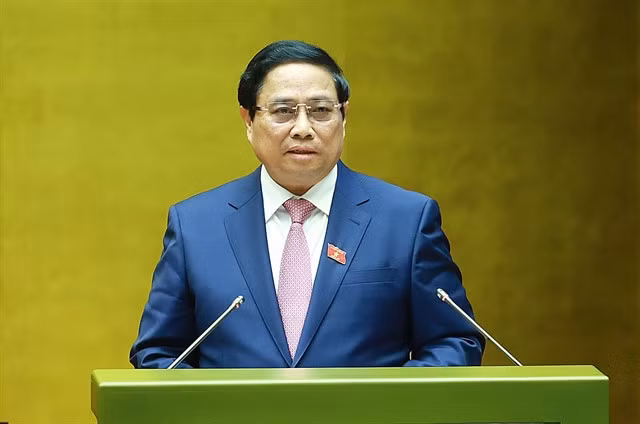 Prime Minister Phạm Minh Chính addressing the National Assembly on Monday. VNA/VNS Photo Dương Giang