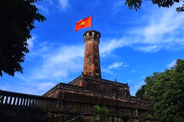 The national flag flies high on the Hà Nội Flag Tower.