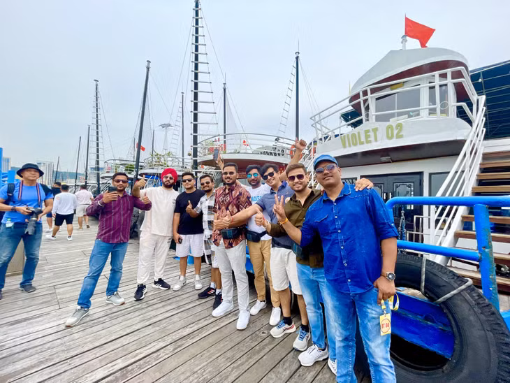 Indian tourists take check-in photos at Ha Long International Passenger Port.