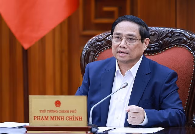 Prime Minister Phạm Minh Chính chairs a meeting of the steering committee for reviewing and untangling knots in the legal document system on Wednesday. VNA/VNS Photo