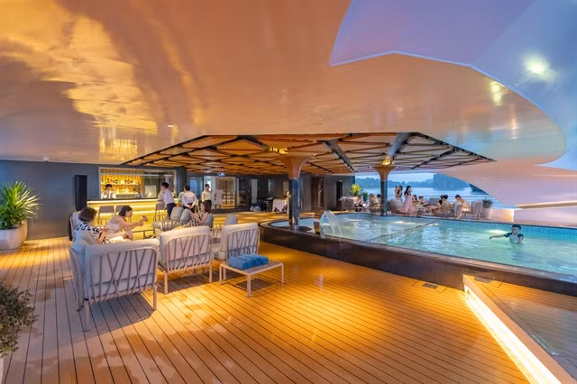 Grand Pioneers II's swimming pool, a place for relax and having a drink after a busy day,