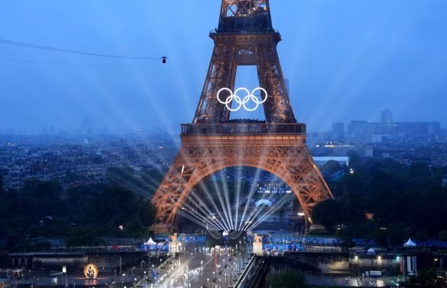 On the evening of July 26, Paris time, the Opening Ceremony of the Olympics Paris 2024 took place on the Seine River flowing through the centre of Paris, France. Despite the rain, 1.5 billion spectators worldwide admired the parade of athletes and numerous spectacular performances of the first opening ceremony outdoors. XINHUA/VNA Photo