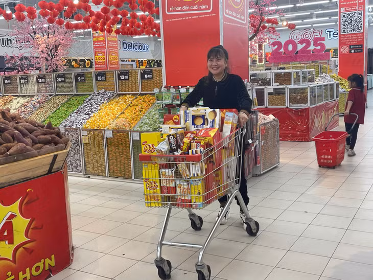 Local people look excited about preparing for Tet.