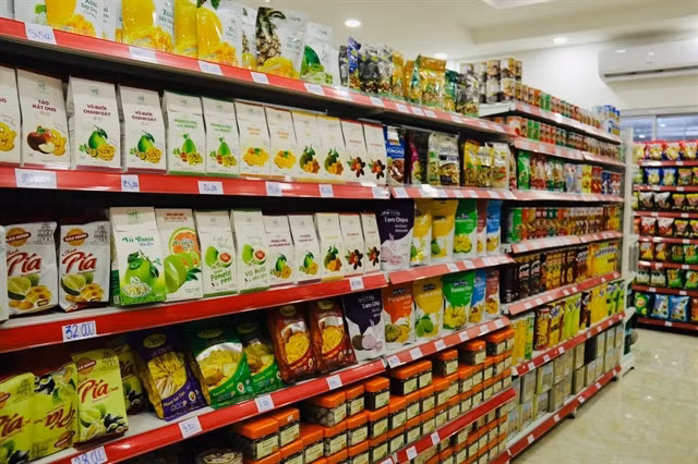 Vietnamese products at a supermarket in Laos. VNA/VNS Photo