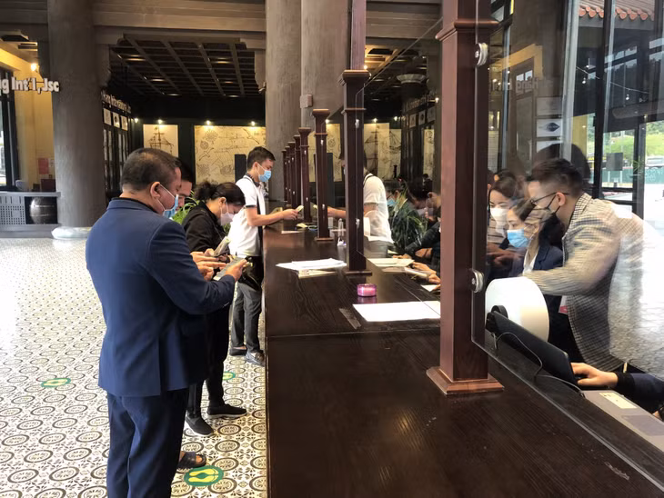Tourists buy tickets at Ha Long International Passenger Port.