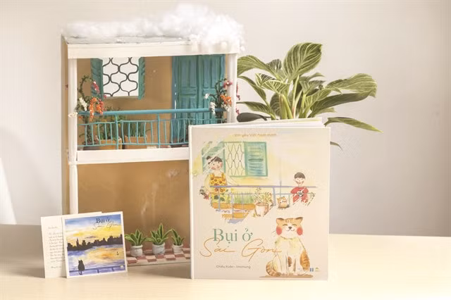 LIVELY ART: The art book Bụi Ở Sài Gòn (Living in Sài Gòn) includes many watercolour paintings. It encourages child readers discover the world and people. Photo courtesy of the publisher.