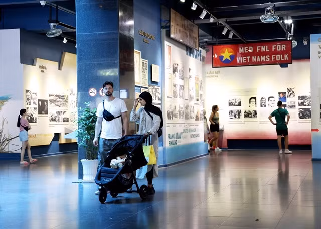 Foreign tourists visit the War Remnants Museum in HCM City. — VNA/VNS Photo