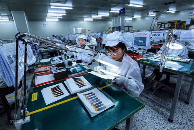 Electronic circuit boards being tested at a factory in Bắc Ninh Province. — VNA/VNS Photo Danh Lam