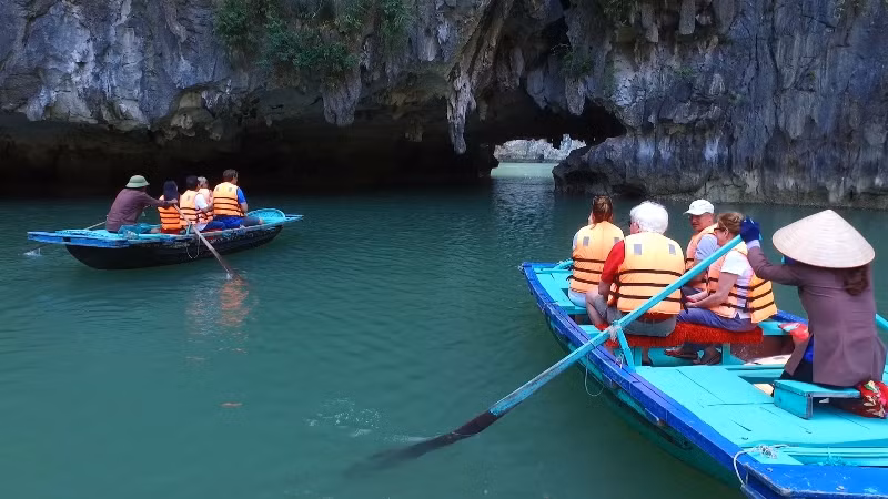 Boat rowing to visit Ba Ham Lake