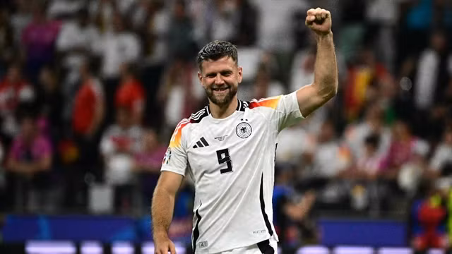 Germany's Niclas Fuellkrug celebrates his equaliser against Switzerland. AFP/VNA Photos