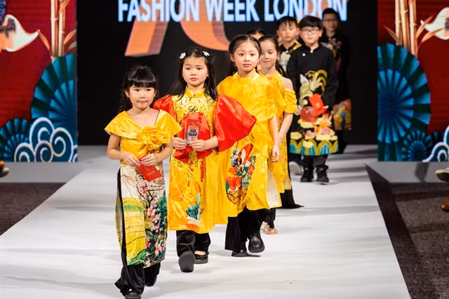 UK-based Vietnamese children present áo dài designs of Love Collection at House of iKons Fashion Week London.