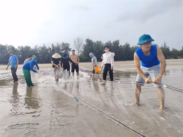Visitors join an unforgettable experience known as "A Day as a Fisherman” in Bình Ngọc.