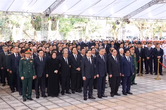 President Tô Lâm, Politburo Member and President, leads the Central Party Committee delegation to pay respects to General Secretary Nguyễn Phú Trọng. VNA/VNS Photos