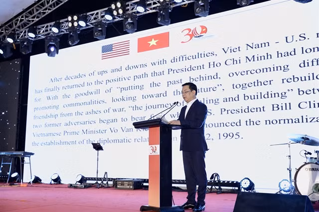 Đồng Huy Cương, Vice President of the Việt Nam Union of Friendship Organisations delivers his speech at the “Việt Nam - United States Friendship Festival” held on Sunday afternoon in Hà Nội.—Photo courtesy of VUFO