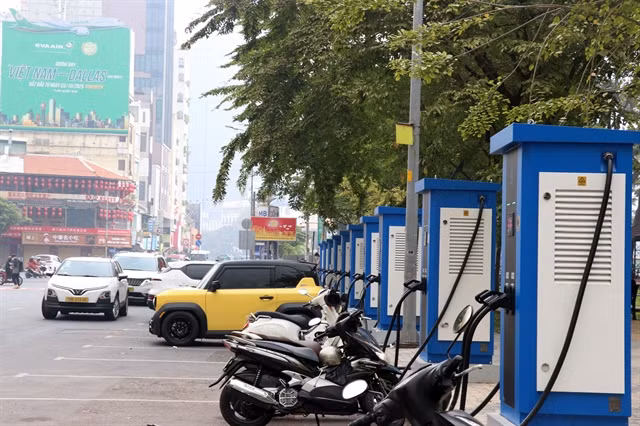 Electric motorbikes charging at a station in HCM City on December 17. — VNA/VNS Photo