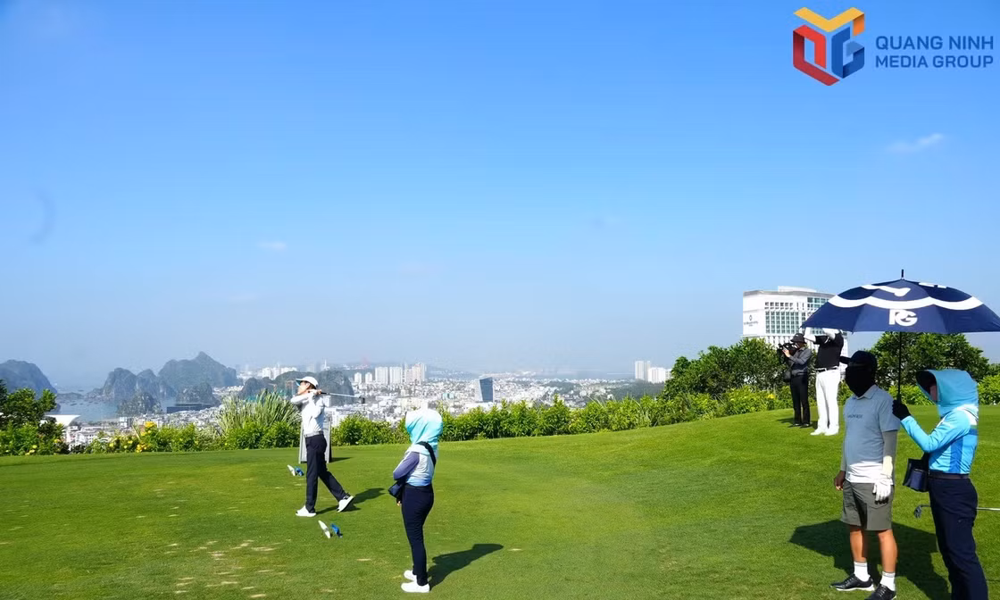 Tourists play golf at FLC Ha Long Golf Course in Ha Long ward.